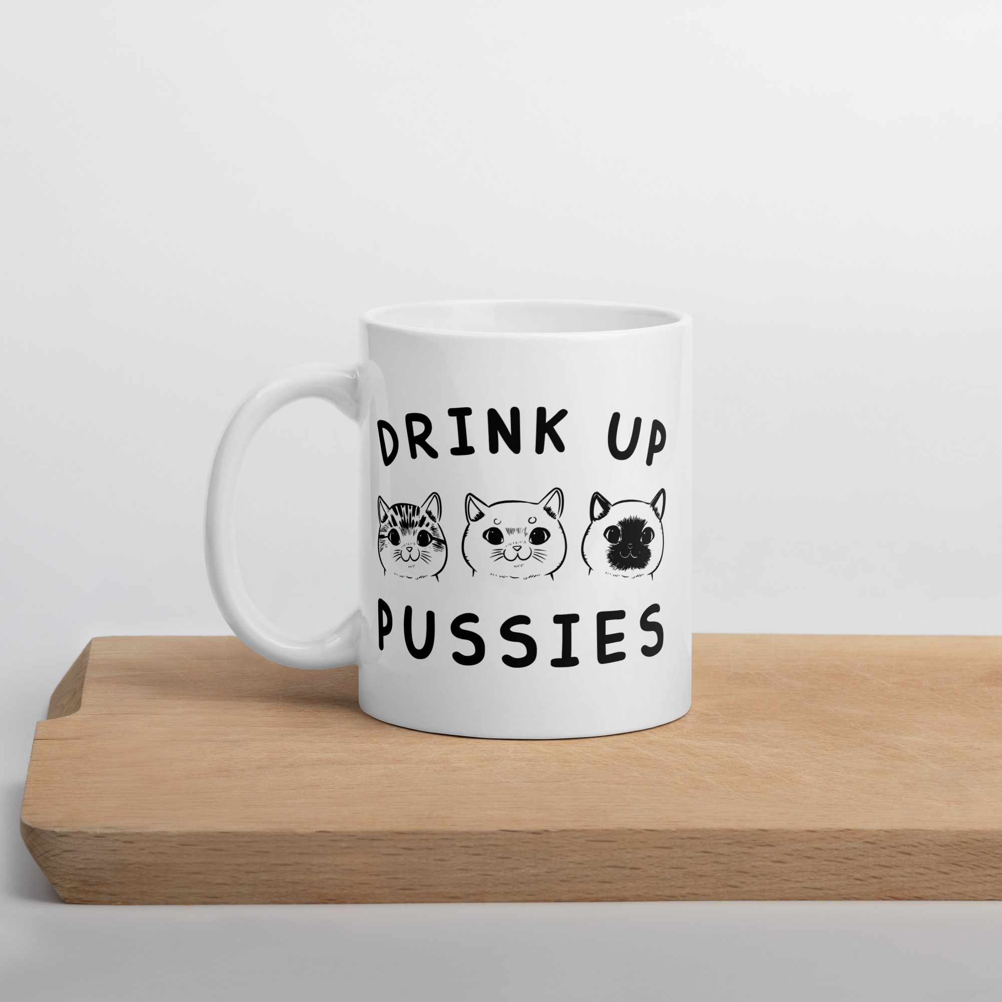Drink up Pussies White glossy mug